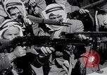 Image of Armed Arab civilian militia brandishing weapons Tripoli Libya, 1962, second 30 stock footage video 65675039880