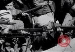 Image of Armed Arab civilian militia brandishing weapons Tripoli Libya, 1962, second 32 stock footage video 65675039880