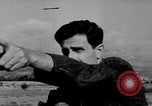 Image of Armed Arab civilian militia brandishing weapons Tripoli Libya, 1962, second 33 stock footage video 65675039880