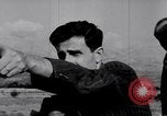 Image of Armed Arab civilian militia brandishing weapons Tripoli Libya, 1962, second 34 stock footage video 65675039880