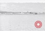 Standbild Krankenwagen transportiert Patienten Flugplatz Guatemala, 1954, aus Sekunde 1 historischem Filmmaterial Videoclip 65675039889