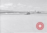 Standbild Krankenwagen transportiert Patienten Flugplatz Guatemala, 1954, aus Sekunde 4 historischem Filmmaterial Videoclip 65675039889