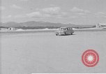 Standbild Krankenwagen transportiert Patienten Flugplatz Guatemala, 1954, aus Sekunde 7 historischem Filmmaterial Videoclip 65675039889