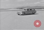 Standbild Krankenwagen transportiert Patienten Flugplatz Guatemala, 1954, aus Sekunde 10 historischem Filmmaterial Videoclip 65675039889
