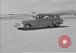 Standbild Krankenwagen transportiert Patienten Flugplatz Guatemala, 1954, aus Sekunde 11 historischem Filmmaterial Videoclip 65675039889