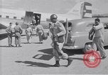 Standbild Krankenwagen transportiert Patienten Flugplatz Guatemala, 1954, aus Sekunde 13 historischem Filmmaterial Videoclip 65675039889