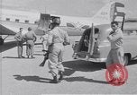 Standbild Krankenwagen transportiert Patienten Flugplatz Guatemala, 1954, aus Sekunde 14 historischem Filmmaterial Videoclip 65675039889