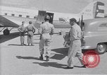 Standbild Krankenwagen transportiert Patienten Flugplatz Guatemala, 1954, aus Sekunde 15 historischem Filmmaterial Videoclip 65675039889