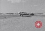 Standbild Krankenwagen transportiert Patienten Flugplatz Guatemala, 1954, aus Sekunde 17 historischem Filmmaterial Videoclip 65675039889
