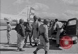 Standbild Krankenwagen transportiert Patienten Flugplatz Guatemala, 1954, aus Sekunde 26 historischem Filmmaterial Videoclip 65675039889