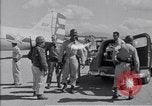 Standbild Krankenwagen transportiert Patienten Flugplatz Guatemala, 1954, aus Sekunde 28 historischem Filmmaterial Videoclip 65675039889