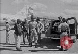 Standbild Krankenwagen transportiert Patienten Flugplatz Guatemala, 1954, aus Sekunde 29 historischem Filmmaterial Videoclip 65675039889