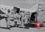 Standbild Krankenwagen transportiert Patienten Flugplatz Guatemala, 1954, aus Sekunde 31 historischem Filmmaterial Videoclip 65675039889