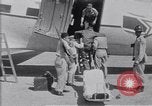 Standbild Krankenwagen transportiert Patienten Flugplatz Guatemala, 1954, aus Sekunde 43 historischem Filmmaterial Videoclip 65675039889