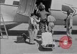 Standbild Krankenwagen transportiert Patienten Flugplatz Guatemala, 1954, aus Sekunde 44 historischem Filmmaterial Videoclip 65675039889