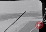 Standbild Krankenwagen transportiert Patienten Flugplatz Guatemala, 1954, aus Sekunde 62 historischem Filmmaterial Videoclip 65675039889