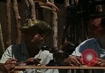 Image of United States soldiers interrogating Vietnamese South Vietnam, 1962, second 4 stock footage video 65675039891