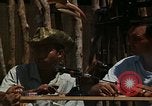 Image of United States soldiers interrogating Vietnamese South Vietnam, 1962, second 5 stock footage video 65675039891