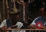 Image of United States soldiers interrogating Vietnamese South Vietnam, 1962, second 7 stock footage video 65675039891