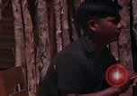 Image of United States soldiers interrogating Vietnamese South Vietnam, 1962, second 25 stock footage video 65675039891