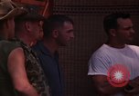 Image of United States soldiers interrogating Vietnamese South Vietnam, 1962, second 42 stock footage video 65675039891