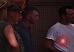 Image of United States soldiers interrogating Vietnamese South Vietnam, 1962, second 44 stock footage video 65675039891