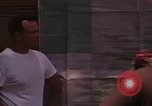 Image of United States soldiers interrogating Vietnamese South Vietnam, 1962, second 50 stock footage video 65675039891