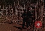 Image of American soldier of Special Forces South Vietnam, 1962, second 18 stock footage video 65675039894