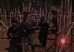 Image of American soldier of Special Forces South Vietnam, 1962, second 20 stock footage video 65675039894