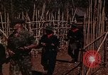 Image of American soldier of Special Forces South Vietnam, 1962, second 21 stock footage video 65675039894