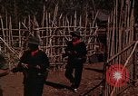 Image of American soldier of Special Forces South Vietnam, 1962, second 22 stock footage video 65675039894