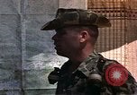 Image of American soldier South Vietnam, 1962, second 6 stock footage video 65675039896