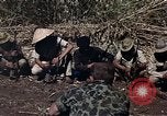 Image of American soldier of Special Forces South Vietnam, 1962, second 27 stock footage video 65675039897