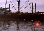 Image of freighter Saigon Vietnam, 1962, second 7 stock footage video 65675039899