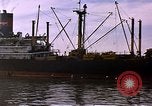 Image of freighter Saigon Vietnam, 1962, second 10 stock footage video 65675039899