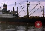 Image of freighter Saigon Vietnam, 1962, second 12 stock footage video 65675039899