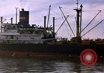 Image of freighter Saigon Vietnam, 1962, second 14 stock footage video 65675039899