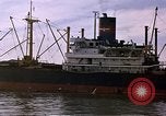 Image of freighter Saigon Vietnam, 1962, second 21 stock footage video 65675039899