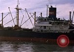 Image of freighter Saigon Vietnam, 1962, second 22 stock footage video 65675039899