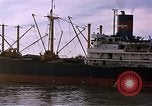 Image of freighter Saigon Vietnam, 1962, second 24 stock footage video 65675039899