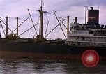 Image of freighter Saigon Vietnam, 1962, second 25 stock footage video 65675039899