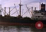 Image of freighter Saigon Vietnam, 1962, second 26 stock footage video 65675039899