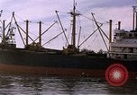 Image of freighter Saigon Vietnam, 1962, second 28 stock footage video 65675039899