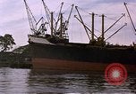 Image of freighter Saigon Vietnam, 1962, second 37 stock footage video 65675039899