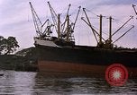Image of freighter Saigon Vietnam, 1962, second 38 stock footage video 65675039899