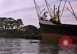 Image of freighter Saigon Vietnam, 1962, second 43 stock footage video 65675039899