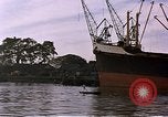 Image of freighter Saigon Vietnam, 1962, second 44 stock footage video 65675039899