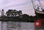 Image of freighter Saigon Vietnam, 1962, second 49 stock footage video 65675039899