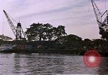 Image of freighter Saigon Vietnam, 1962, second 51 stock footage video 65675039899