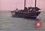 Image of junk or Chinese vessel Southeast Asia, 1962, second 15 stock footage video 65675039900
